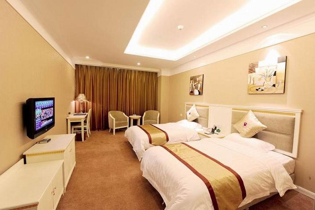 Dragon Hotel Chongqing Rum bild